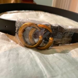 Brown Belt with CC Buckle 1 1/2 " wide  42" long hook to last hole.